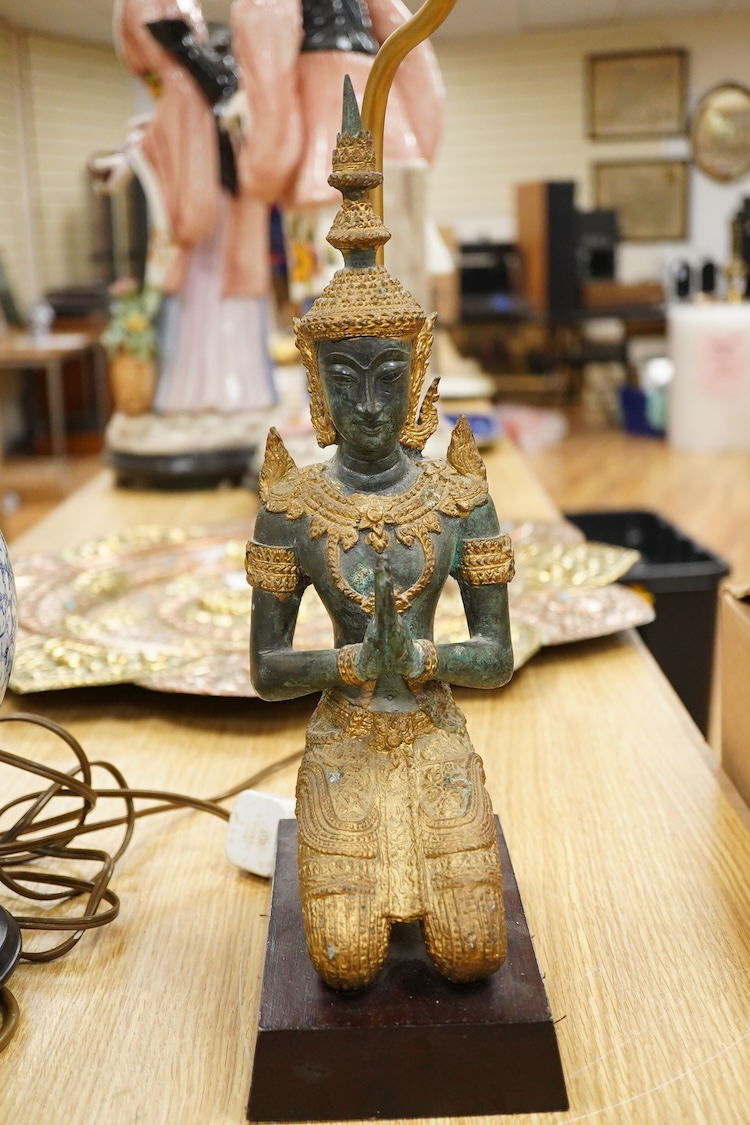A pair of brass candlesticks and a gilt metal two branch gilt candelabrum, 45cm high